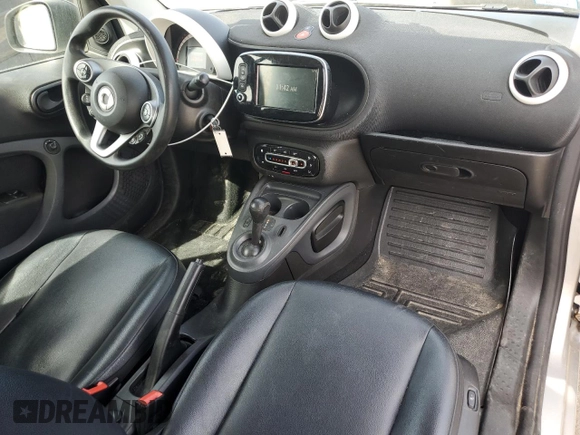 2016 Smart fortwo Passion z VIN WMEFJ5DAXGK123943, wystawiony jako Copart lot #51904865 z przebiegiem 69 821 mil mil oraz Szkody całkowita. Historia ofert i sprzedaży dostępna na DreamBid. Obrazek 8.