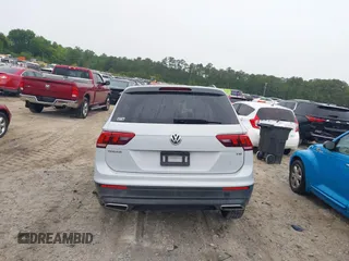 2018 Volkswagen Tiguan S with VIN 3VV1B7AX0JM041120, listed as a IAAI auction lot 42219662 with 160,852 mi miles and . Bid and sale history available at DreamBid. Image 16.