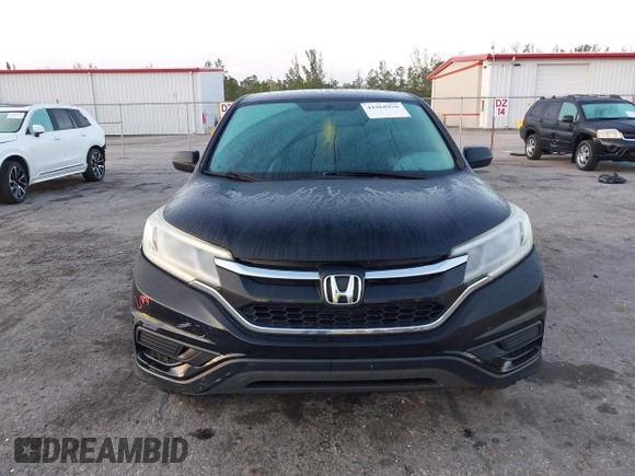 2015 Honda CR-V LX with VIN 5J6RM4H35FL038634, listed as a IAAI auction lot 41968956 with 149,407 mi miles and . Bid and sale history available at DreamBid. Image 12.