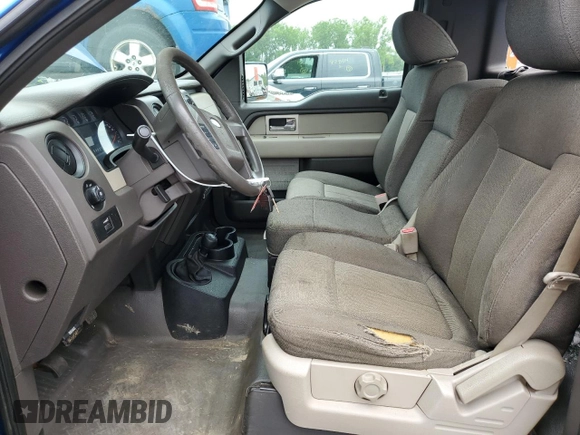 2010 Ford F-150 XL with VIN 1FTMF1EW2AKB85161, listed as a Copart auction lot 63741515 with 173,982 mi miles and Salvage title. Bid and sale history available at DreamBid. Image 7.