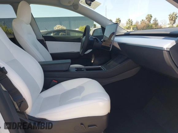 2021 Tesla Model Y Long Range with VIN 5YJYGDEEXMF280480, listed as a IAAI auction lot 41993633 with 69,579 mi miles. Bid and sale history available at carsss.com. Image 5.
