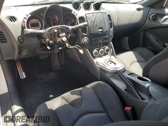 2012 Nissan 370Z z VIN JN1AZ4EH1CM562134, wystawiony jako Copart lot #56708065 z przebiegiem Nie podano mil oraz Szkoda całkowita • Salvage title. Historia ofert i sprzedaży dostępna na DreamBid. Obrazek 8.