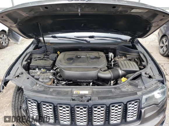 2018 Jeep Grand Cherokee Altitude with VIN 1C4RJEAG0JC208506, listed as a Copart auction lot 52669915 with 159,299 mi miles and Salvage title. Bid and sale history available at DreamBid. Image 11.