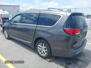 2020 Chrysler Pacifica Touring L with VIN 2C4RC1BG1LR269004, listed as a IAAI auction lot 42287228 with 71,498 mi miles and . Bid and sale history available at DreamBid. Image 3.