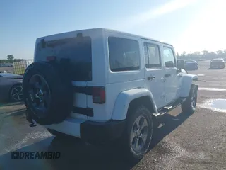 2016 Jeep Wrangler Unlimited 75th Anniversary z VIN 1C4BJWEG1GL250449, wystawiony jako IAAI lot #42204012 z przebiegiem 180 173 mil mil oraz . Historia ofert i sprzedaży dostępna na DreamBid. Obrazek 4.