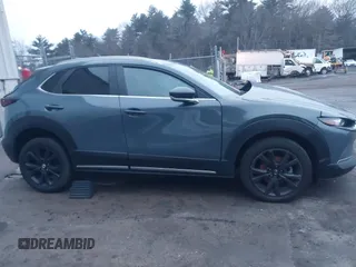 2023 Mazda CX-30 S Carbon Edition with VIN 3MVDMBCM5PM545150, listed as a IAAI auction lot 41104881 with 30,459 mi miles and . Bid and sale history available at DreamBid. Image 13.