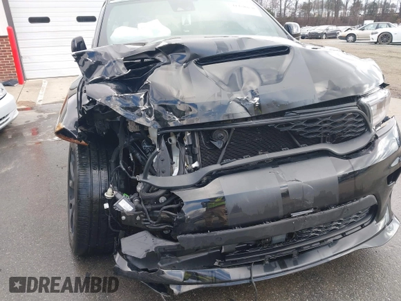 2023 Dodge Durango SRT Hellcat Premium with VIN 1C4SDJH90PC557375, listed as a IAAI auction lot 41328850 with 30,697 mi miles and . Bid and sale history available at DreamBid. Image 6.