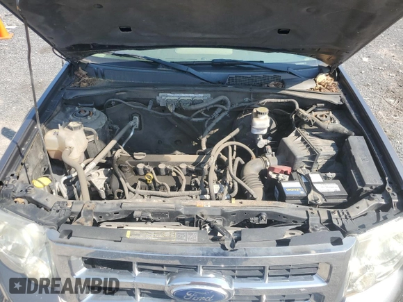 2012 Ford Escape XLS with VIN 1FMCU0C78CKA70652, listed as a Copart auction lot 60624215 with 203,220 mi miles and Clean title. Bid and sale history available at DreamBid. Image 12.