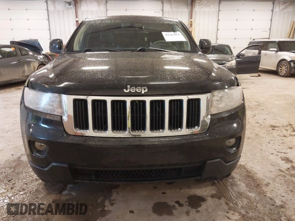 2012 Jeep Grand Cherokee Laredo with VIN 1C4RJFAT1CC225479, listed as a IAAI auction lot 41709911 with 227,150 mi miles. Bid and sale history available at carsss.com. Image 12.