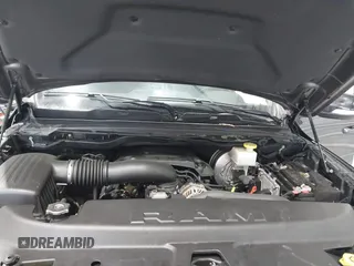 2021 Ram 1500 Big Horn z VIN 1C6SRFBT8MN696504, wystawiony jako IAAI lot #41669093 z przebiegiem 63 356 mil mil oraz . Historia ofert i sprzedaży dostępna na DreamBid. Obrazek 10.