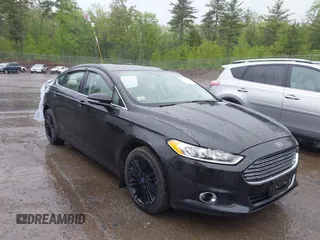 2014 Ford Fusion SE z VIN 3FA6P0H98ER161265, wystawiony jako IAAI lot #42312309 z przebiegiem 141 975 mil mil oraz . Historia ofert i sprzedaży dostępna na DreamBid. Obrazek 1.
