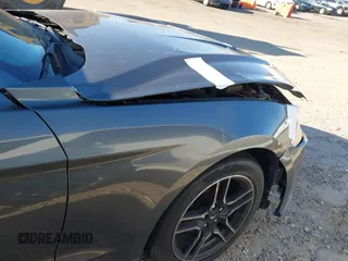2021 Ford Mustang EcoBoost z VIN 1FATP8UH3M5105279, wystawiony jako IAAI lot #41712821 z przebiegiem 99 760 mil mil oraz . Historia ofert i sprzedaży dostępna na DreamBid. Obrazek 6.