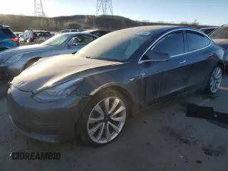 2019 Tesla Model 3 Long Range with VIN 5YJ3E1EB8KF477004, listed as a Copart auction lot 86192984 with 0 mi miles and Salvage Title. Bid and sale history available at carsss.com. Image 1.