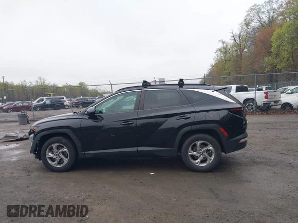 2022 Hyundai Tucson SEL with VIN 5NMJBCAE2NH044891, listed as a IAAI auction lot 41956512 with 51,670 mi miles. Bid and sale history available at carsss.com. Image 14.