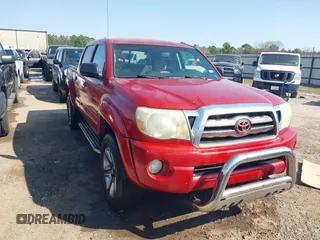 2009 Toyota Tacoma PreRunner with VIN 3TMJU62N69M086123, listed as a IAAI auction lot 41693360 with 221,033 mi miles. Bid and sale history available at carsss.com. Image 1.
