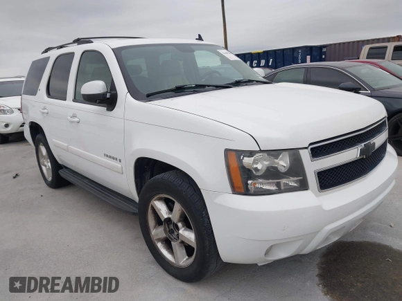 2007 Chevrolet Tahoe LTZ with VIN 1GNFC13027J402178, listed as a IAAI auction lot 41605898 with 203,677 mi miles and . Bid and sale history available at DreamBid. Image 1.