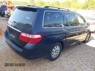 2007 Honda Odyssey Touring with VIN 5FNRL38807B023395, listed as a IAAI auction lot 42047062 with 240,552 mi miles. Bid and sale history available at carsss.com. Image 4.