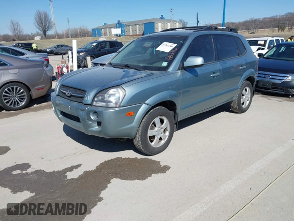 2006 Hyundai Tucson GL with VIN KM8JM12B76U276847, listed as a IAAI auction lot 41767240 with 204,713 mi miles. Bid and sale history available at carsss.com. Image 2.