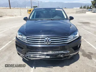 2016 Volkswagen Touareg Sport with VIN WVGEF9BP0GD007399, listed as a Copart auction lot 53990675 with 110,439 mi miles and Salvage Title. Bid and sale history available at DreamBid. Image 5.