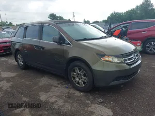 2012 Honda Odyssey LX with VIN 5FNRL5H28CB128574, listed as a IAAI auction lot 42608244 with 239,894 mi miles and . Bid and sale history available at DreamBid. Image 1.