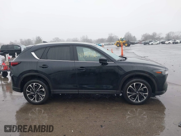 2023 Mazda CX-5 2.5 S Premium Package with VIN JM3KFBDM6P0235133, listed as a IAAI auction lot 41457826 with 7,860 mi miles. Bid and sale history available at carsss.com. Image 13.