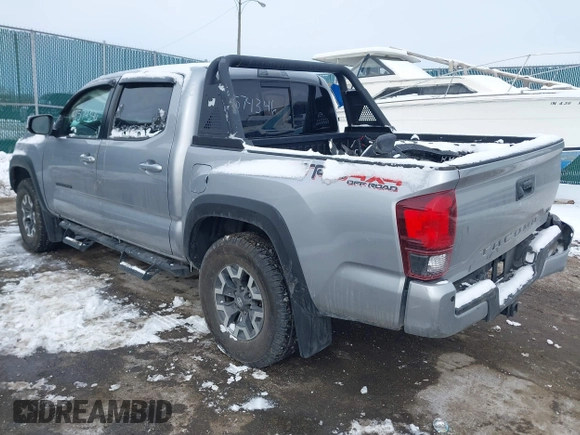 2019 Toyota Tacoma SR z VIN 3TMCZ5AN8KM211246, wystawiony jako IAAI lot #41574346 z przebiegiem 66 825 mil mil oraz . Historia ofert i sprzedaży dostępna na DreamBid. Obrazek 3.