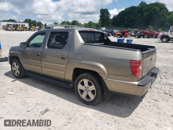2011 Honda Ridgeline RTL with VIN 5FPYK1F59BB007045, listed as a Copart auction lot 61263715 with 159,527 mi miles and Clean title. Bid and sale history available at DreamBid. Image 2.
