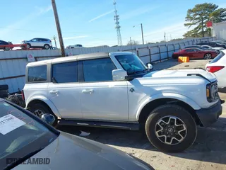 2023 Ford Bronco with VIN 1FMEE5DP0PLC16138, listed as a IAAI auction lot 41310455 with 25,963 mi miles. Bid and sale history available at carsss.com. Image 12.