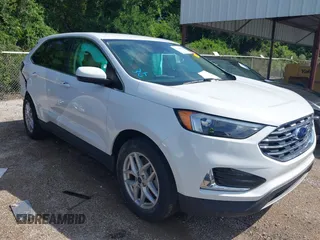 2022 Ford Edge SEL z VIN 2FMPK4J94NBA93720, wystawiony jako IAAI lot #42214406 z przebiegiem 59 157 mil mil oraz . Historia ofert i sprzedaży dostępna na DreamBid. Obrazek 1.