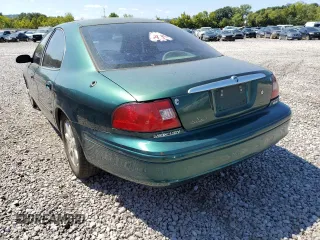 2000 Mercury Sable z VIN 1MEFM53U3YA640153, wystawiony jako Copart lot #55645434 z przebiegiem 249 160 mil mil oraz Szkoda całkowita • Salvage title. Historia ofert i sprzedaży dostępna na DreamBid. Obrazek 3.