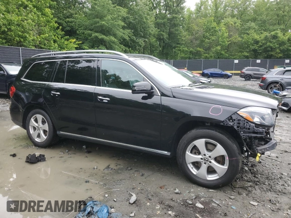 2018 Mercedes-Benz GLS 450 with VIN 4JGDF6EE8JB170616, listed as a Copart auction lot 58005315 with 128,859 mi miles and Salvage title. Bid and sale history available at DreamBid. Image 4.