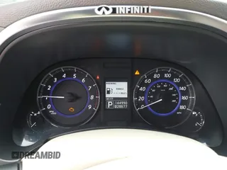 2014 Infiniti QX70 z VIN JN8CS1MU3EM451745, wystawiony jako IAAI lot #42203922 z przebiegiem 144 990 mil mil oraz . Historia ofert i sprzedaży dostępna na DreamBid. Obrazek 7.