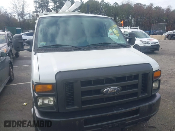 2012 Ford Econoline Cargo Commercial with VIN 1FTNE1EWXCDB38975, listed as a IAAI auction lot 41747167 with 331,484 mi miles and . Bid and sale history available at carsss.com. Image 12.