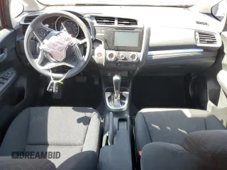 2015 Honda Fit EX-L with VIN 3HGGK5H87FM701108, listed as a Copart auction lot 55536945 with 57,519 mi miles and Salvage title. Bid and sale history available at DreamBid. Image 8.