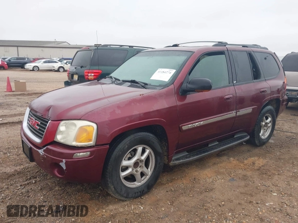 2003 GMC Envoy SLT z VIN 1GKDS13S532314397, wystawiony jako IAAI lot #41184274 z przebiegiem 232 750 mil mil oraz . Historia ofert i sprzedaży dostępna na DreamBid. Obrazek 2.