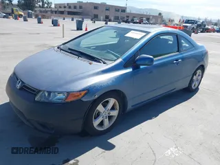2007 Honda Civic Cpe EX with VIN 2HGFG12857H563261, listed as a IAAI auction lot 42026595 with 225,828 mi miles. Bid and sale history available at carsss.com. Image 2.