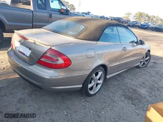 2005 Mercedes-Benz CLK-Class 5.0L with VIN WDBTK75J85F126398, listed as a IAAI auction lot 41890954 with 124,554 mi miles. Bid and sale history available at carsss.com. Image 4.