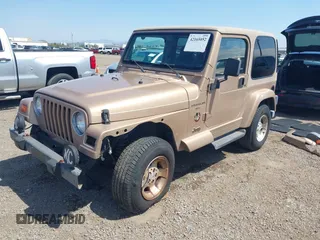 1999 Jeep Wrangler Sahara with VIN 1J4FY49S8XP462512, listed as a IAAI auction lot 42165052 with 146,135 mi miles and . Bid and sale history available at DreamBid. Image 18.