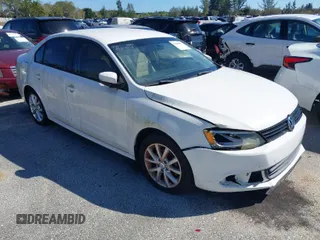 2012 Volkswagen Jetta Sedan SE w/Convenience with VIN 3VWDX7AJ2CM367784, listed as a IAAI auction lot 41386552 with 104,744 mi miles. Bid and sale history available at carsss.com. Image 1.