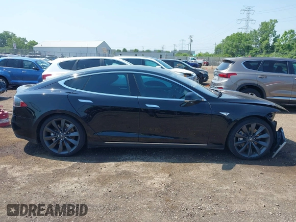 2013 Tesla Model S Performance with VIN 5YJSA1CP5DFP25346, listed as a IAAI auction lot 42463047 with 112,909 mi miles and . Bid and sale history available at DreamBid. Image 14.