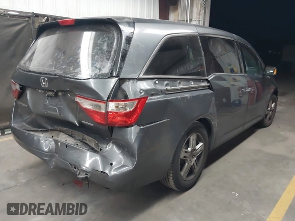 2012 Honda Odyssey Touring с VIN 5FNRL5H99CB047340, выставлен на аукционе IAAI как лот 41965189 с пробегом Не указан миль и . История ставок и продаж доступна на DreamBid. Изображение 4.