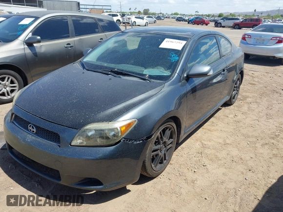 2006 Scion tC z VIN JTKDE177060115047, wystawiony jako IAAI lot #41967294 z przebiegiem 251 237 mil mil oraz . Historia ofert i sprzedaży dostępna na DreamBid. Obrazek 2.