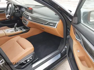 2017 BMW 7 Series 740i xDrive z VIN WBA7E4C55HGU99165, wystawiony jako IAAI lot #42073278 z przebiegiem 47 506 mil mil oraz . Historia ofert i sprzedaży dostępna na DreamBid. Obrazek 5.