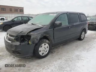2012 Dodge Grand Caravan SE with VIN 2C4RDGBG0CR167919, listed as a Copart auction lot 87717935 with 124,003 mi miles and Salvage Title. Bid and sale history available at DreamBid. Image 1.