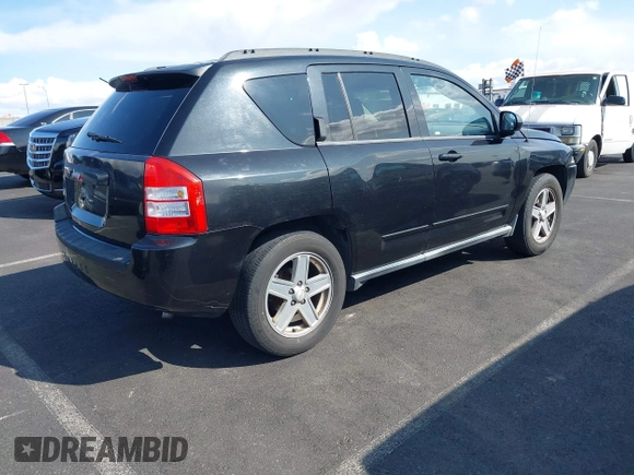 2010 Jeep Compass North Edition with VIN 1J4NF4FB3AD504356, listed as a IAAI auction lot 41924451 with 157,066 mi miles. Bid and sale history available at carsss.com. Image 4.