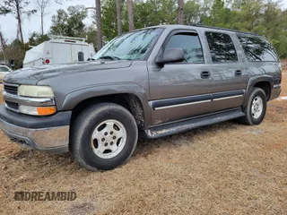 2001 Chevrolet Suburban LS z VIN 3GNEC16T51G199135, wystawiony jako IAAI lot #41748202 z przebiegiem 247 648 mil mil oraz . Historia ofert i sprzedaży dostępna na DreamBid. Obrazek 2.