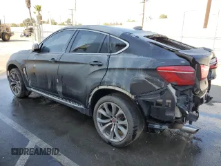 2016 BMW X6 sDrive35i with VIN 5UXKU0C58G0F93204, listed as a Copart auction lot 73562584 with 137,462 mi miles and Salvage Title. Bid and sale history available at carsss.com. Image 2.