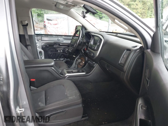 2018 Chevrolet Colorado 4WD LT z VIN 1GCGTCEN6J1146104, wystawiony jako IAAI lot #42338356 z przebiegiem 71 043 mil mil oraz . Historia ofert i sprzedaży dostępna na DreamBid. Obrazek 5.