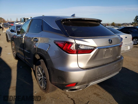 2021 Lexus RX with VIN 2T2AZMDAXMC275791, listed as a Copart auction lot 40304433 with 39,010 mi miles. Bid and sale history available at carsss.com. Image 2.