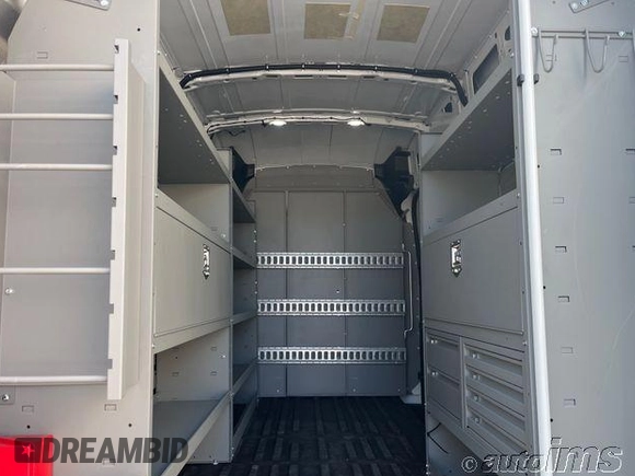 2023 Ford Transit Cargo with VIN 1FTBR1X83PKC02653, listed as a IAAI auction lot 42789310 with 242 mi miles and . Bid and sale history available at DreamBid. Image 3.